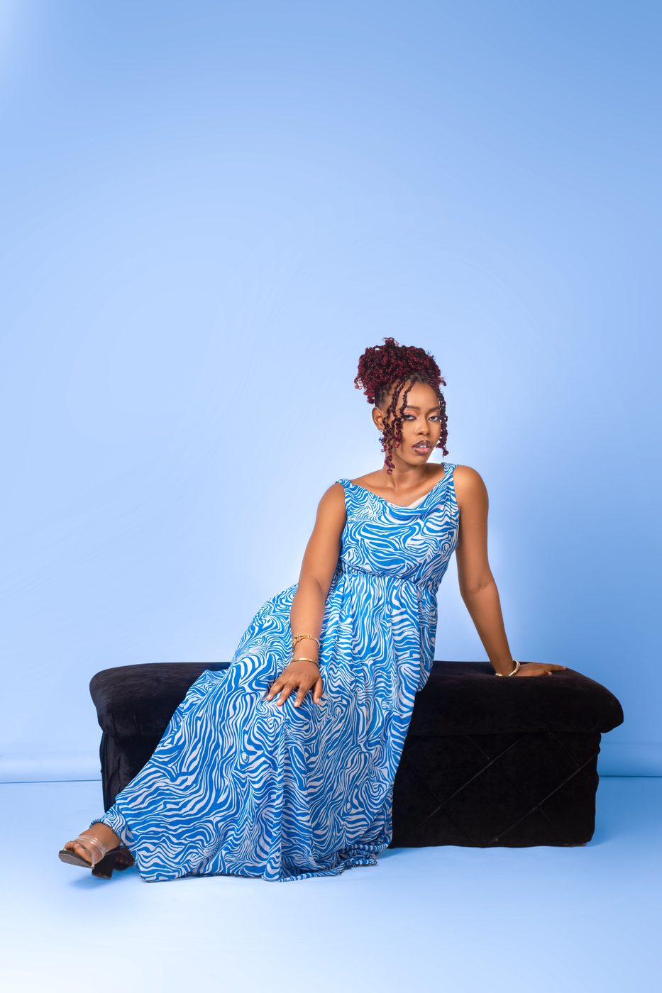 Studio fashion portrait, seated